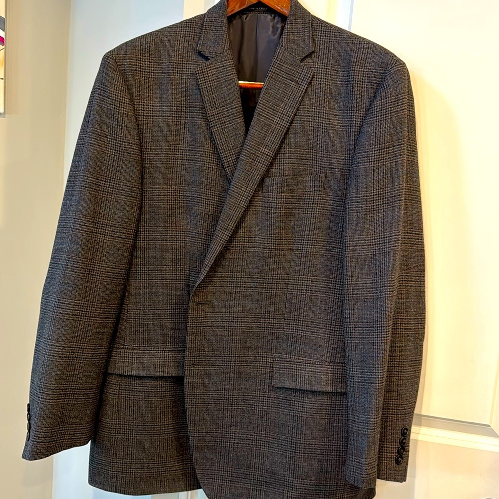 Double vented brown blazer w/ blue and gray pinpoints. 48L.Excellent condition.